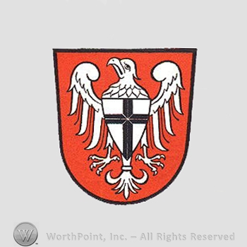 Heraldry: shield, eagle, cross inside a shield.