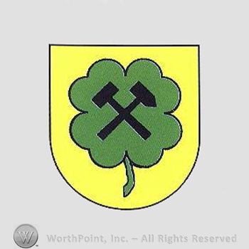 Heraldry: shield, hammers, clover leaf.