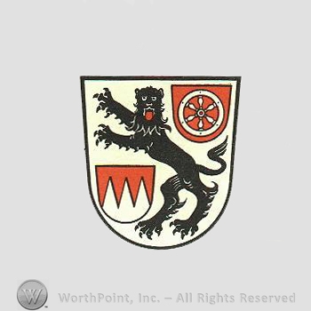 Heraldry: shield, panther, wheel, dents.