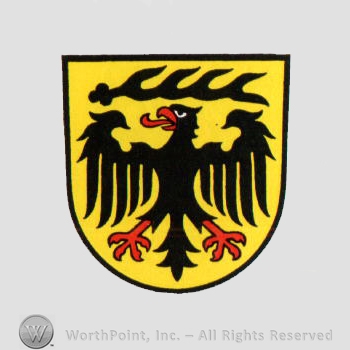Heraldry: shield, eagle, antler.