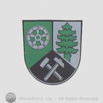 Heraldry: shield, wheel, pine tree, hammers.