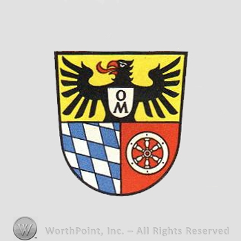 Heraldry: shield, eagle, diamonds pattern, wheel.