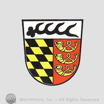 Heraldry: shield, antler, horns, diamonds pattern.