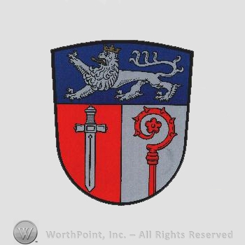 Heraldry: shield, lion, sword, monastery stick.