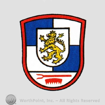 Heraldry: shield, lion, fork, comb.