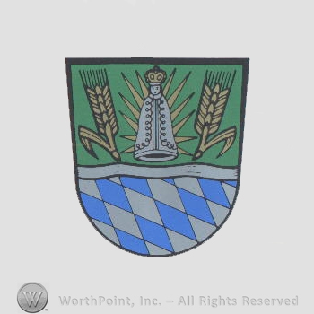 Heraldry: shield, wheat, diamonds pattern, figurine with crown.