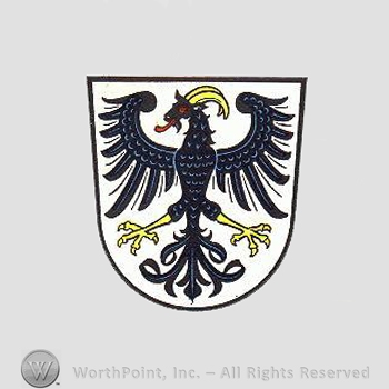 Heraldry: shield, eagle, goat's head.