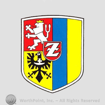 Heraldry: shield, lion, eagle, letter Z, blue and yellow lines.