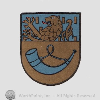 Heraldry: shield, lion rampant, horn.