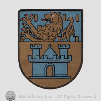 Heraldry: shield, lion rampant, castle.