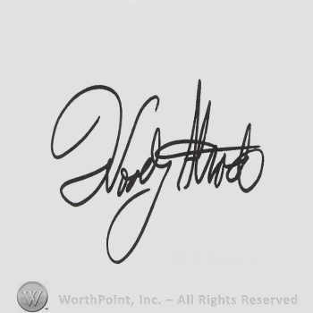 Signature: Woody Strode.