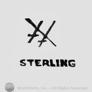 The text ''Sterling'' and two crosses.&nbsp;