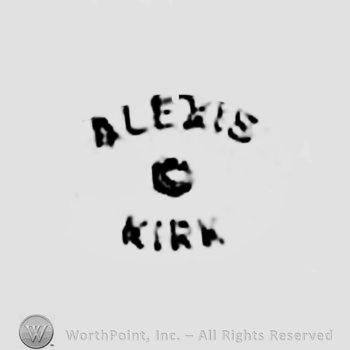 The text Alexis Kirk '' and a circle.