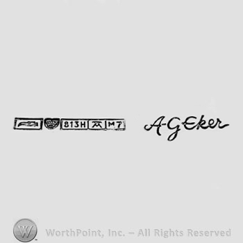 The text ''A-G Eker'', four borders and a heart.