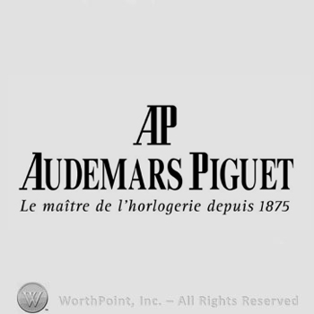 The monogram of the letters ''A'' and ''P'' and the text ''Audemars Piguet Le maitre de l'horlogerie depuis 1875''.