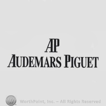 The monogram of the letters ''A'' and ''P'' and the text ''Audemars Piguet''.