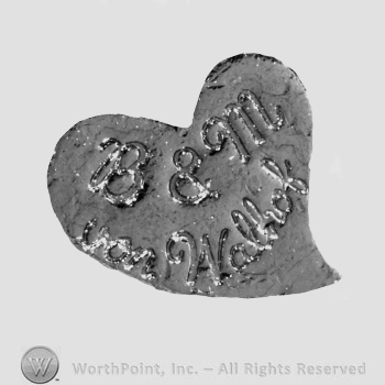 The text ''B & M von Walhof'' in a heart.