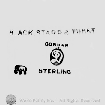 The text ''Black, Starr & Frost Gorham Sterling'', the letter ''D'' in a circle and an elephant.