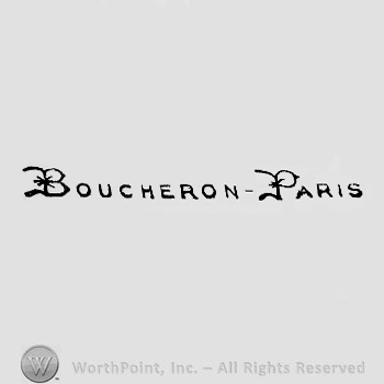 The text ''Boucheron - Paris'' and a flower.
