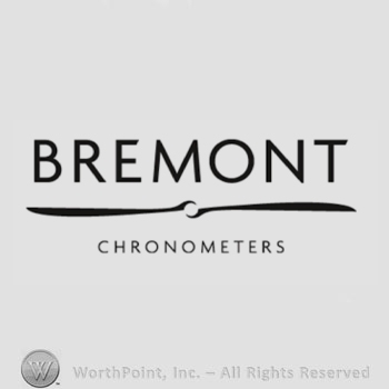 The text ''Bremont Chronometers'' and below the lettering, a stylized silhouette of a propeller.