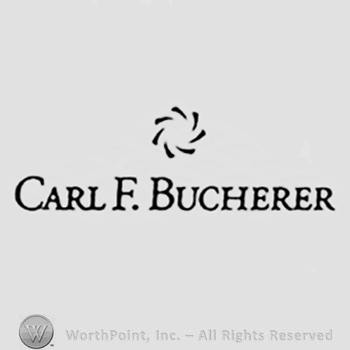 The text ''Carl F. Bucherer'' and a flower.
