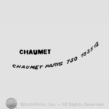 The text ''Chaumet'' and ''Chaumet Paris 150 193512''.