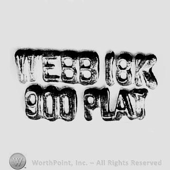 The text ''Webb 18K 900 Plat''.