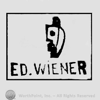 A border, the text ''Ed. Wiener'' and shape like a street lamp.