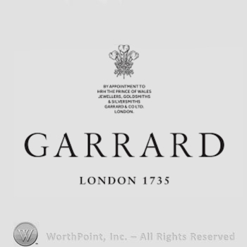The text ''Gerard London 1735'' and a bouquet of flowers.