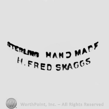 The text ''Sterling Handmade H. Fred Skaggs''.