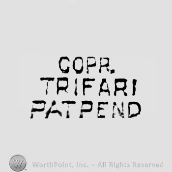 The text ''Copr Trifari Patpend''.