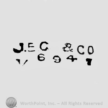 The text ''J.E.C. & Co.'' and the numbers ''694''.