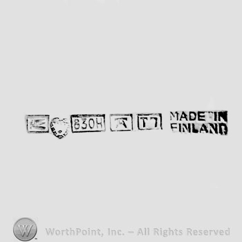 The text ''Made in Finland'', a heart and four borders.
