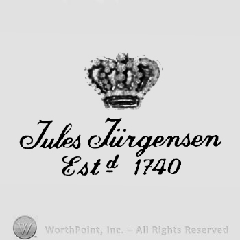 The text ''Jules Jurgensen Estd. 1740'' and a crown.