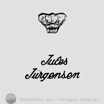 The text ''Jules Jurgensen'' and a crown.