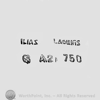 The text ''Ilias Lalaounis 750'' and a circle.