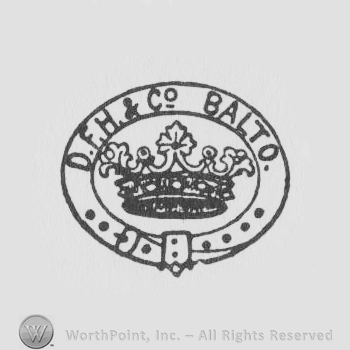 a leather belt with the initials D F H & CO BALTO around a crown
