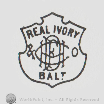 a shield with the text REAL IVORY BALT and the initials DFM&CO
