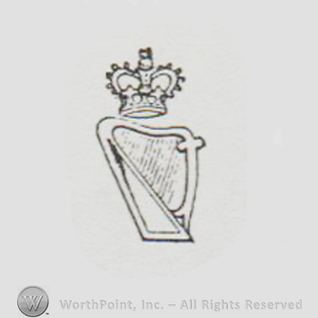 a crown above a harp