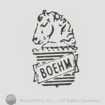 Horse head statue on the base of the statue it is written BOEHM