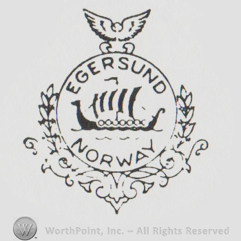 circle with a sail ship inside and an eagle above and the text EGERSUND NORWAY