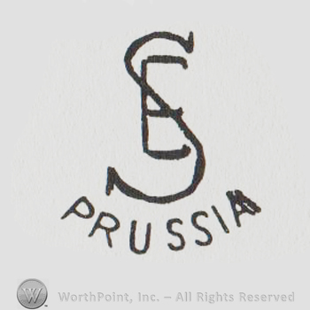 the initials SE overlapping above the word PRUSSIA in uppercase letters