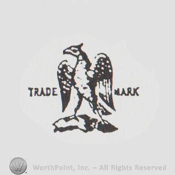 a standing eagle, the word TRADE on the left and the word MARK on the right