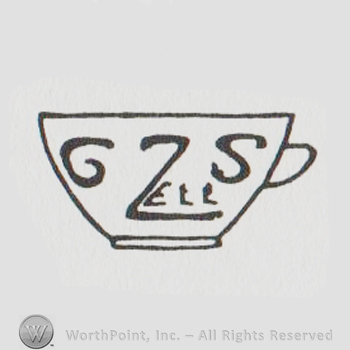 a tea cup with G ZELL S