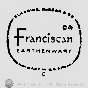 Gladding McBean & Co. written arched on top of an oval shape frame made from little lines, with Franciscan written in the middle above Earthenware , and Made In U.S.A. written on bottom