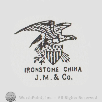 an eagle with its wings sperad above a shield with the US flag above the twxt IRONSTONE CHINA J M & Co