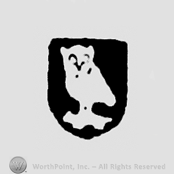 Owl holding a mouse