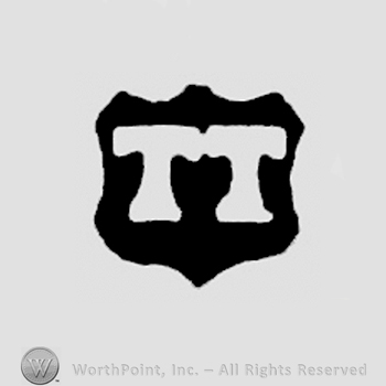 TT