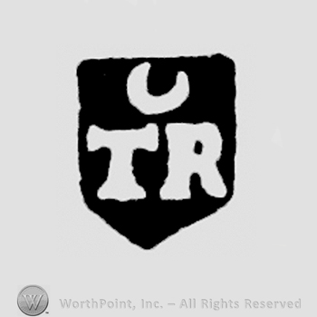 TR, crescent above