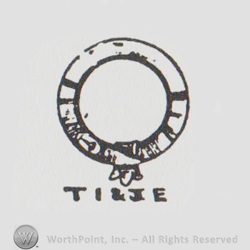 a belt in a circle above the initials T I & J E